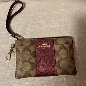Coach wristlet. Basically brand new, never used!